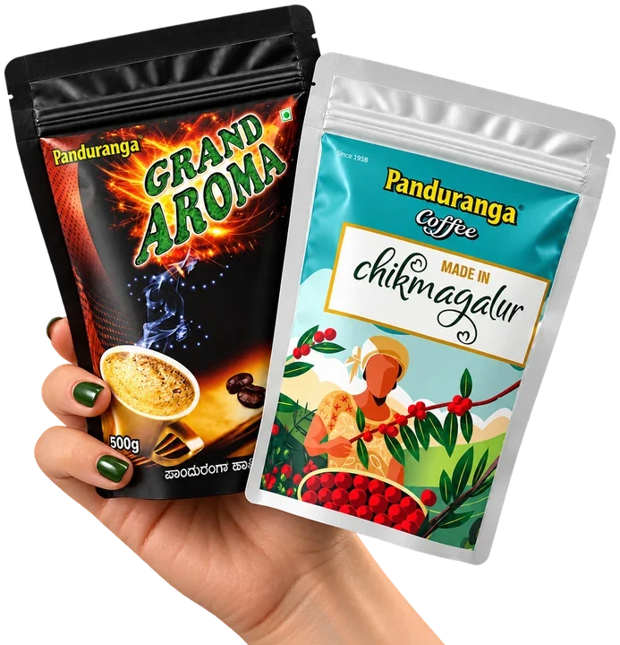 A hand holding Panduranga Grand Aroma and Made in Chikmagalur packs